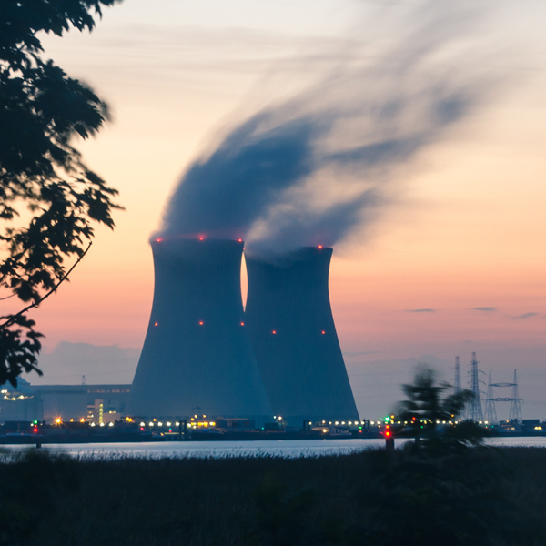 Image of a nuclear power plant at nightfall